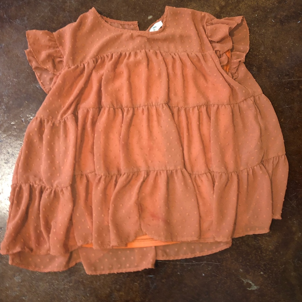 Rust ruffle doll top